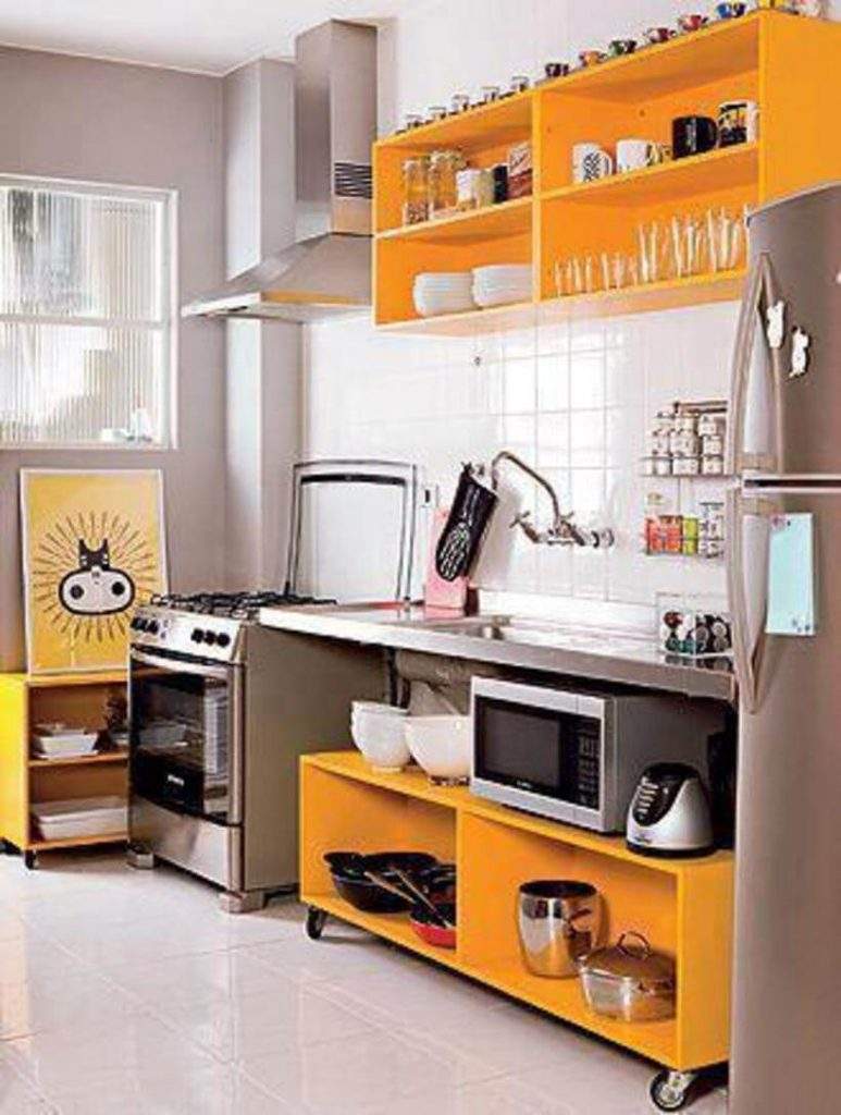Sob a bancada, o módulo com rodízios dá aquela força à organização na cozinha. Foto: Reprodução/Pinterest.